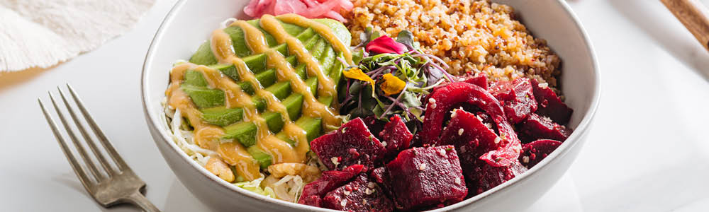 Beets and avocado vegetarian bowl
