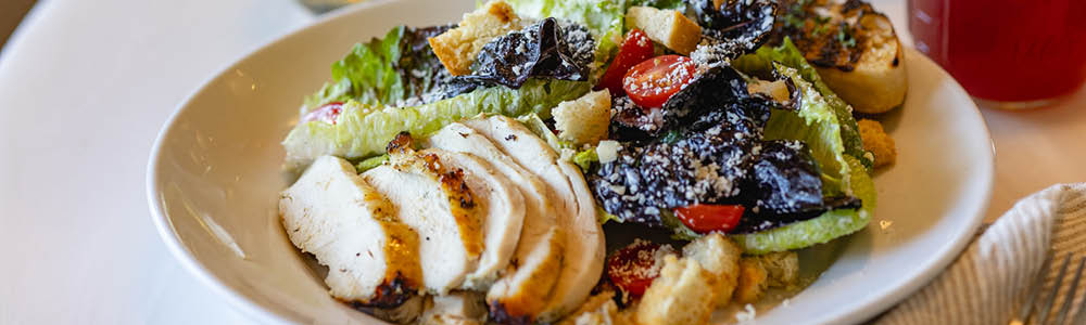 Chicken caesar salad with romaine and parmesan