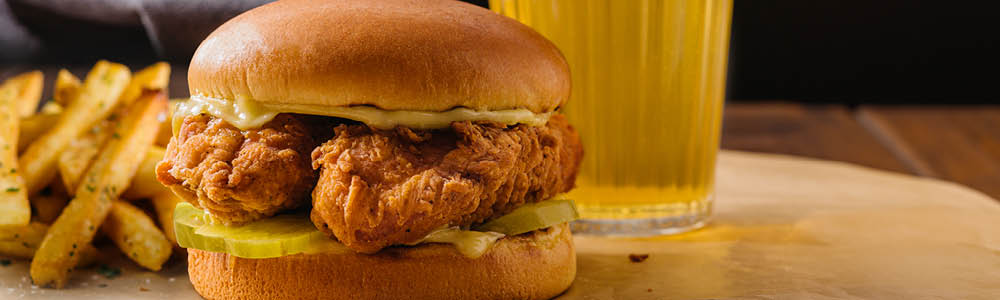 Crispy chicken sandwich with french fries