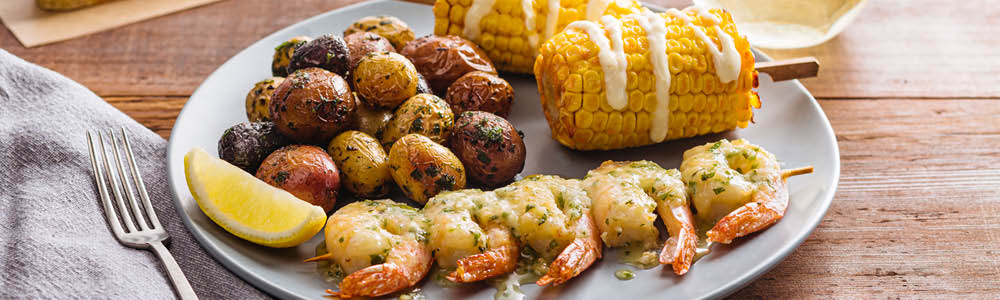 Garlic shrimp plate with sides