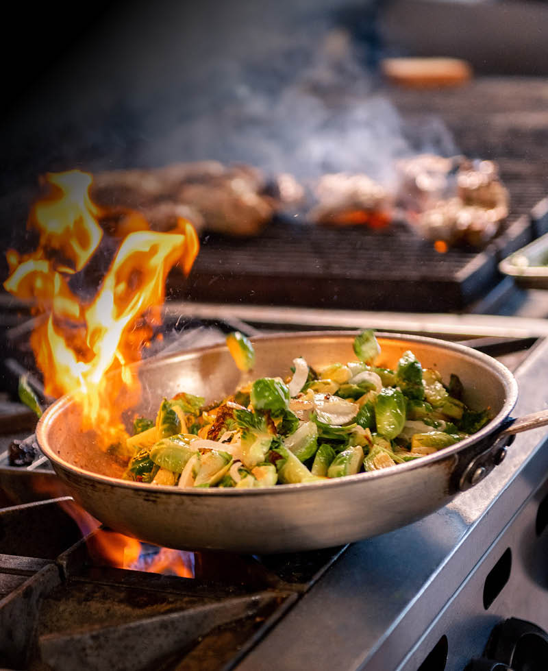 Urban Plates dish being cooked from scratch