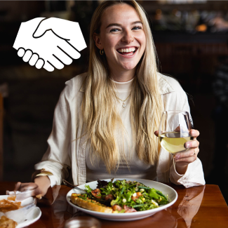 Woman eating Urban Plates meal